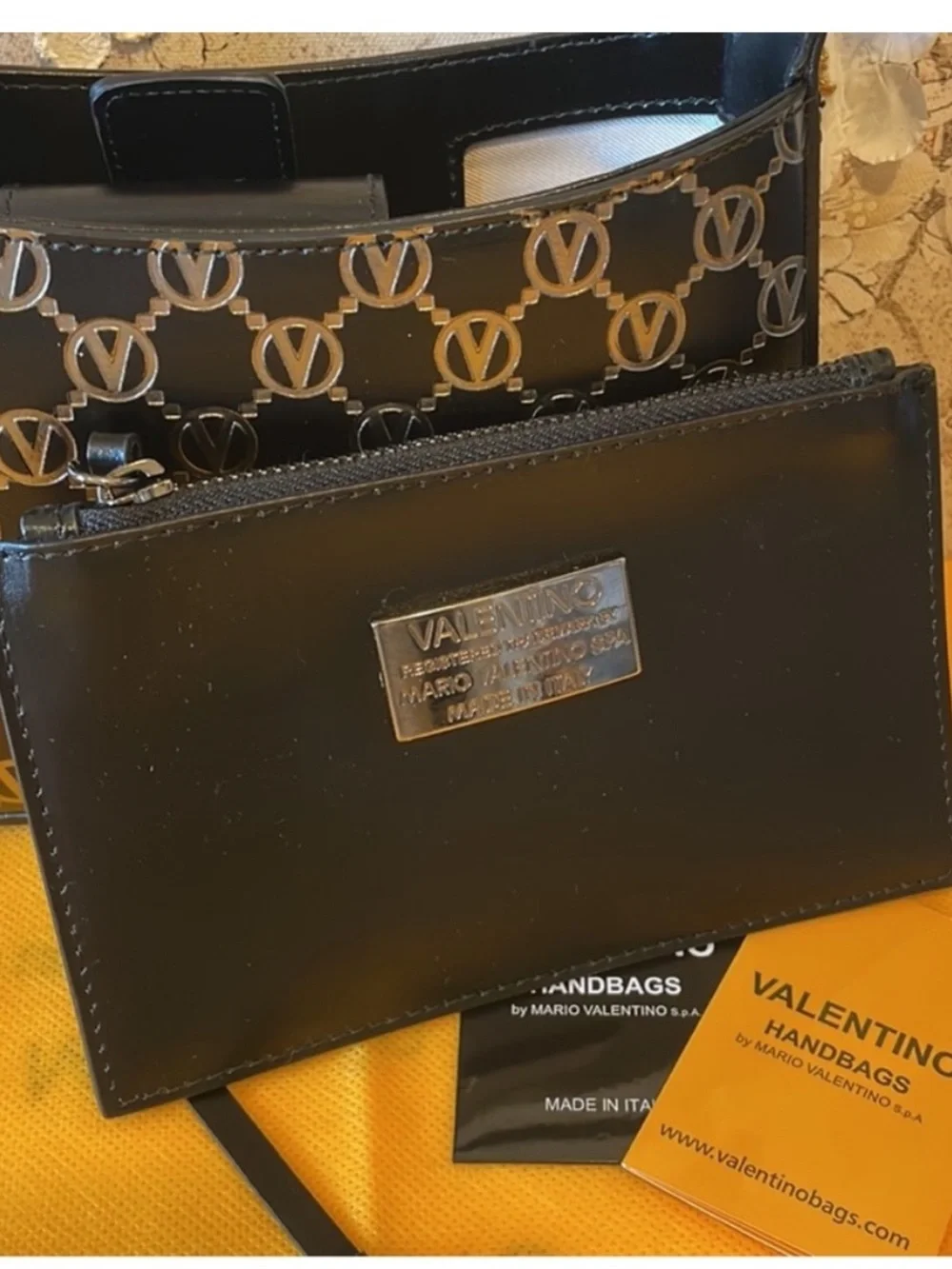 Valentino hand shoulder